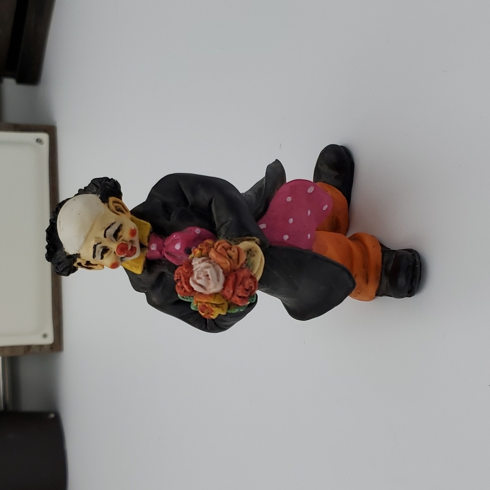 Italian made clown and flower figurine hand painted